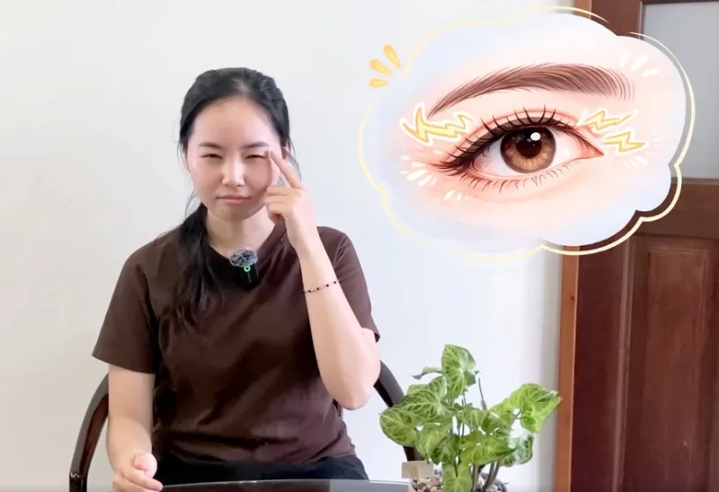 Tâm pointing to her eye next to a twitching-eye illustration